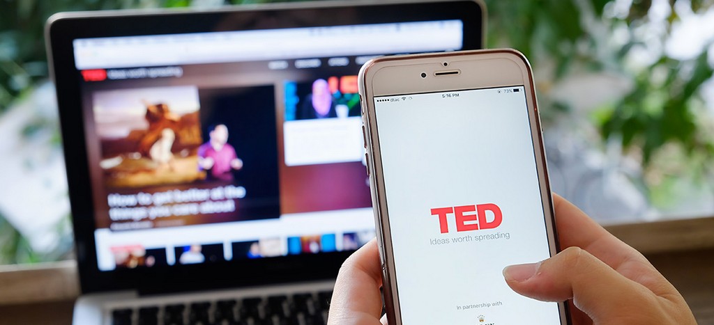Laptop and iPhone showing TED Talks